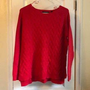 Red cable knit sweater